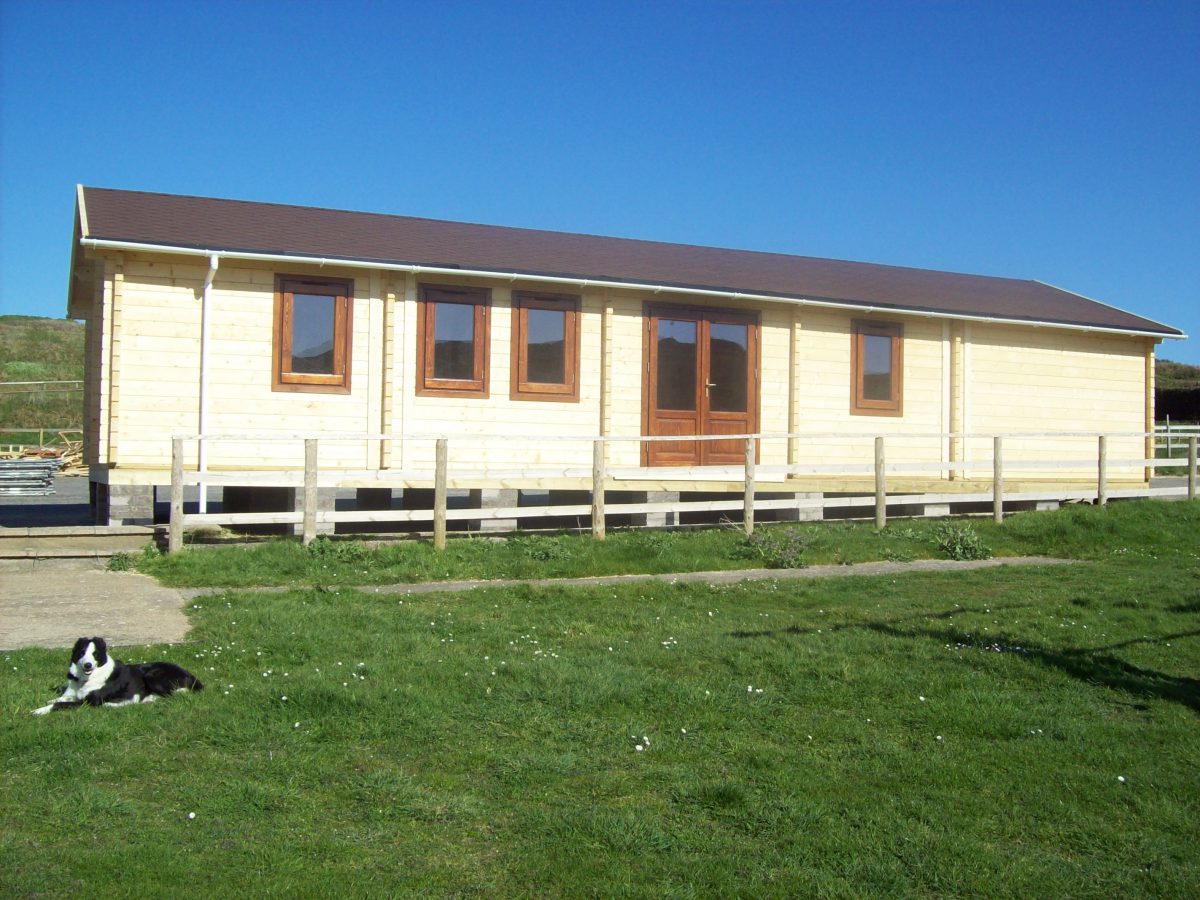 Bespoke 80mm glulam log cabin, Alderney, Channel Islands. South West