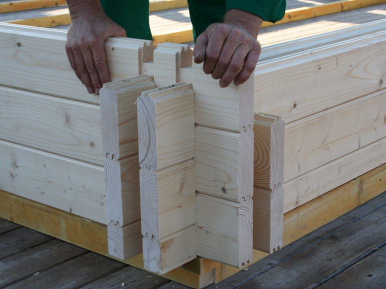 Interlocking log cabins walls