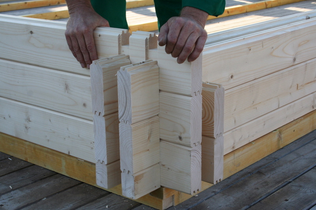 Interlocking log cabins walls